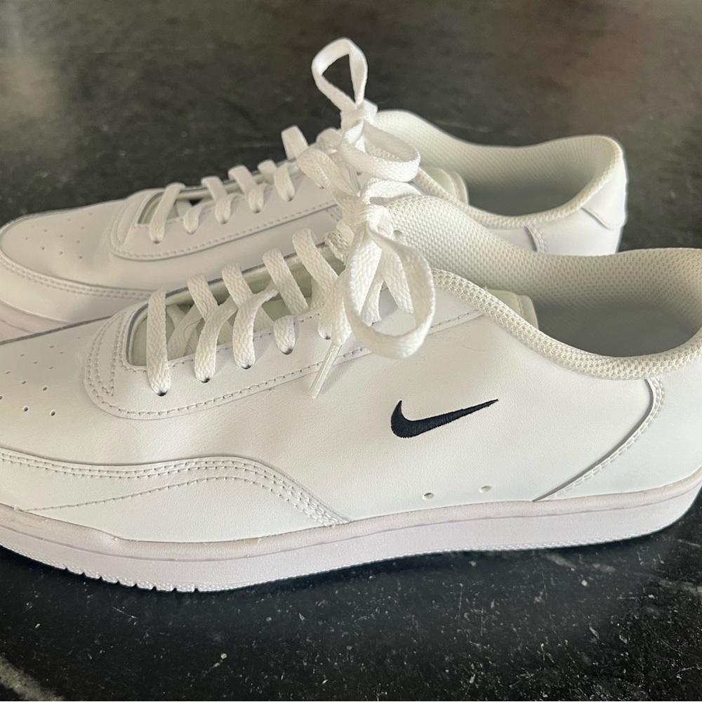 Nike women’s Tennis White and Black Sneakers